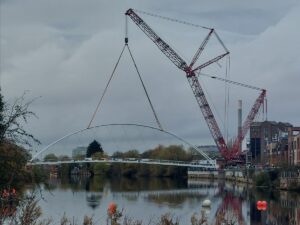 The new bridge being lifted into place